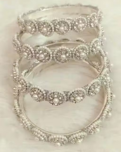 Untitled design - 2026-01-08T150359.870 Party wear bangles are designed to add a touch of elegance and glamour to your festive and special occasion looks. - Image 1