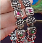 Oxidised bangle set designed to complement ethnic outfits with a bold and traditional appeal
